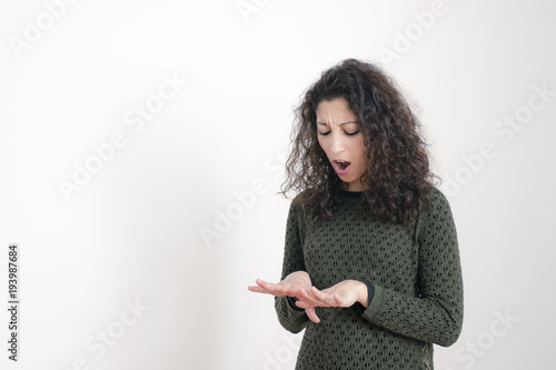 Photography woman looking at her hands