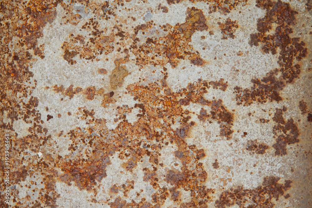 Dark worn rusty metal texture with white paint Dark worn rusty metal texture with white paint
