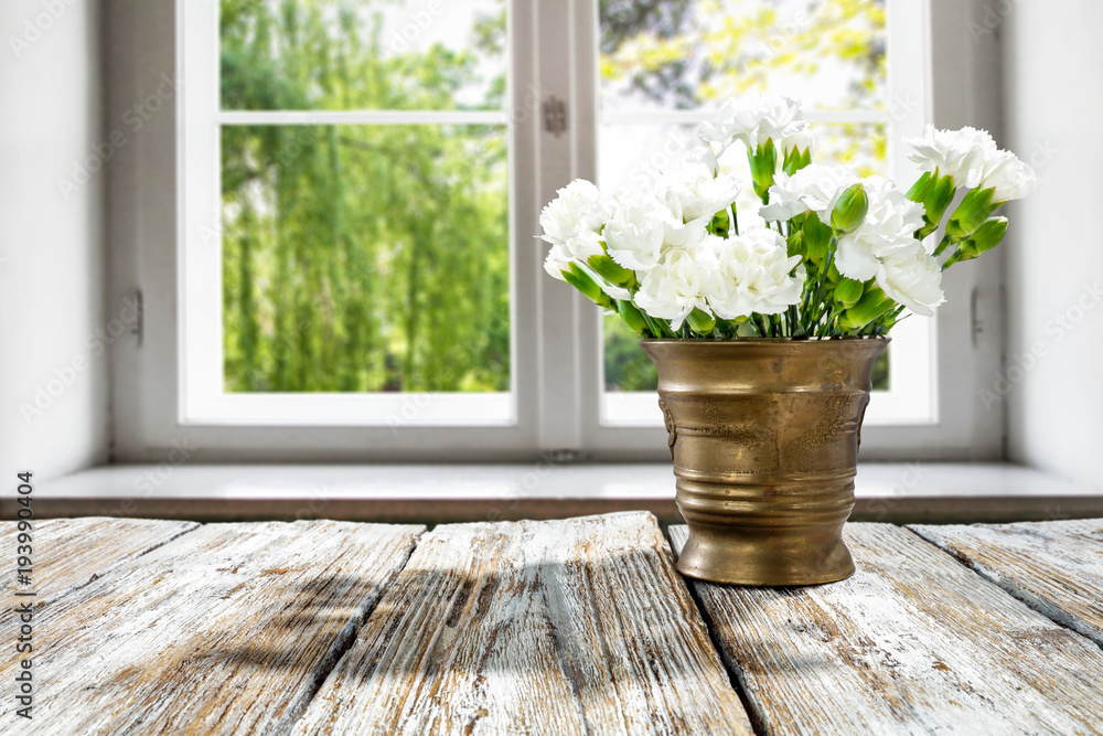 Fototapeta premium desk of free space and flowers 