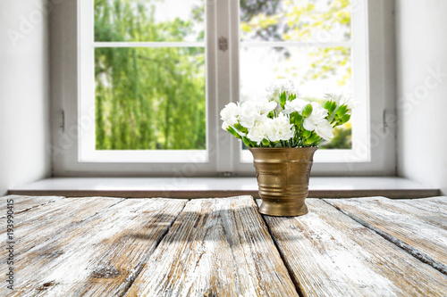 desk of free space and flowers 