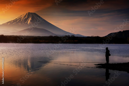 Fishing at lake with Mount Fujisan