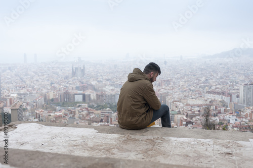 Man with Barcelona view
