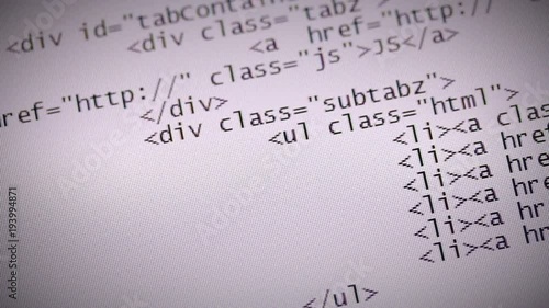 Website development. Closeup of HTML, CSS, JavaScript and PHP code scrolling over white background on computer screen