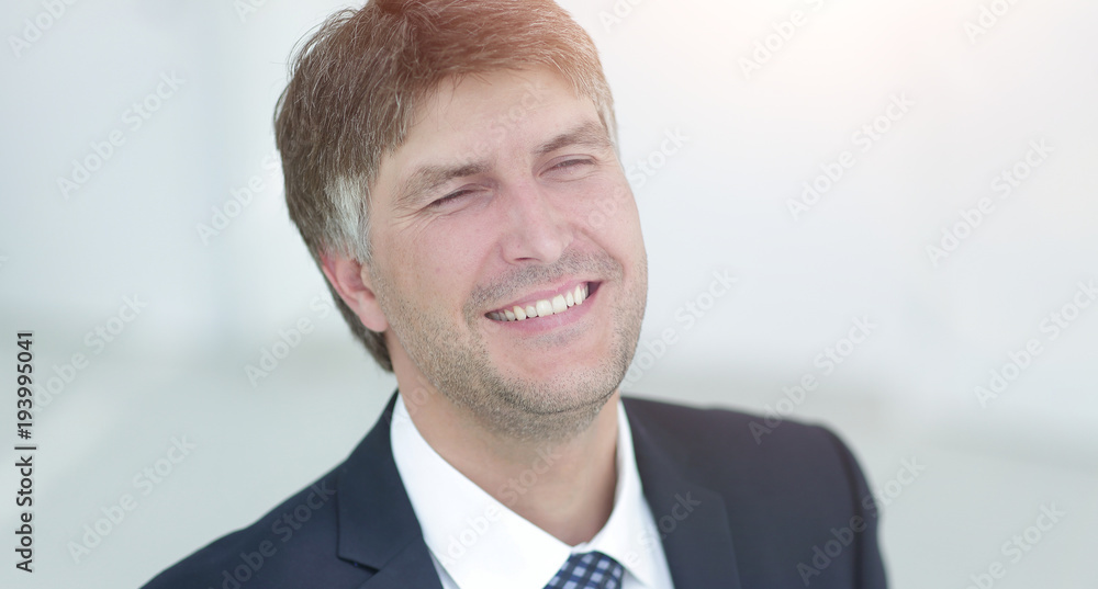 Portrait of a smiling successful businessman. Portrait of a smiling successful businessman.
