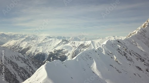 Aerial drone moving slowly forwards - over Austria beautiful winter Landscape snow cold 4k 