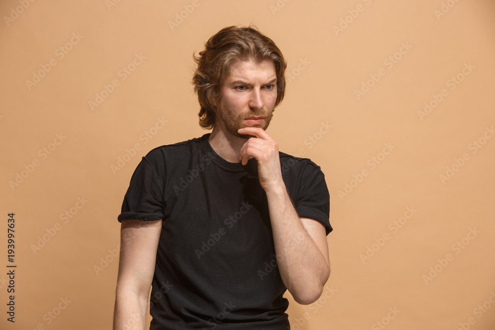 Young serious thoughtful businessman. Doubt concept. Young serious thoughtful businessman. Doubt concept.