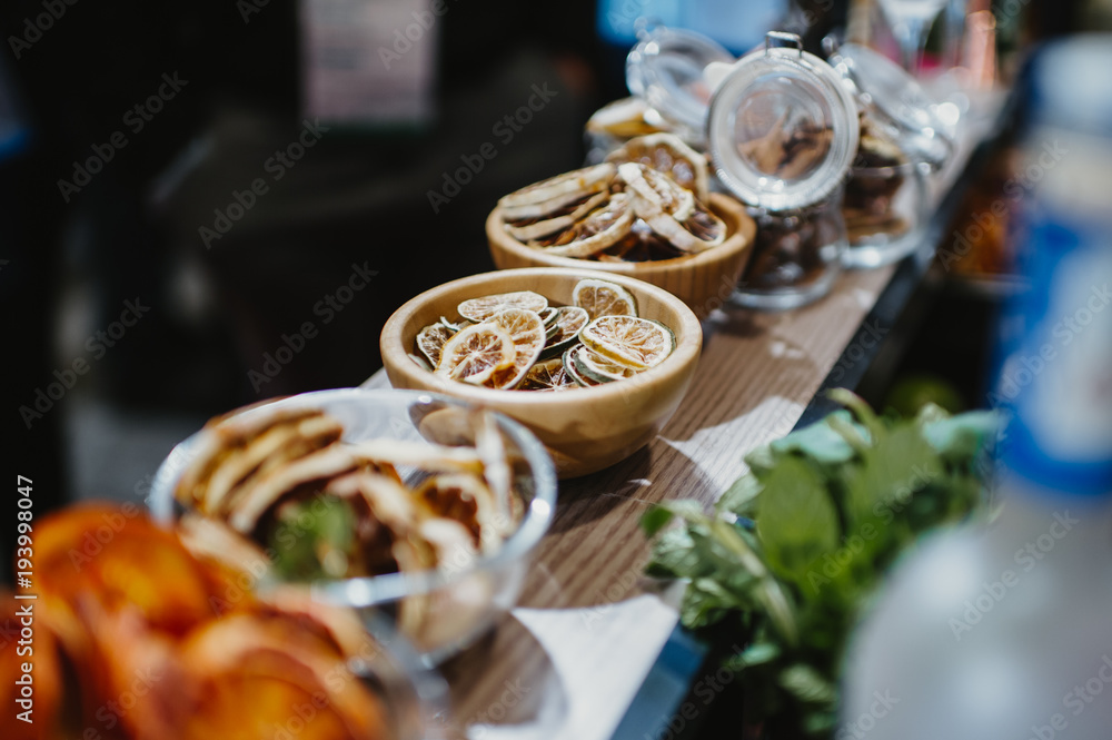 Fototapeta premium Aperitif preparation with dried fruit