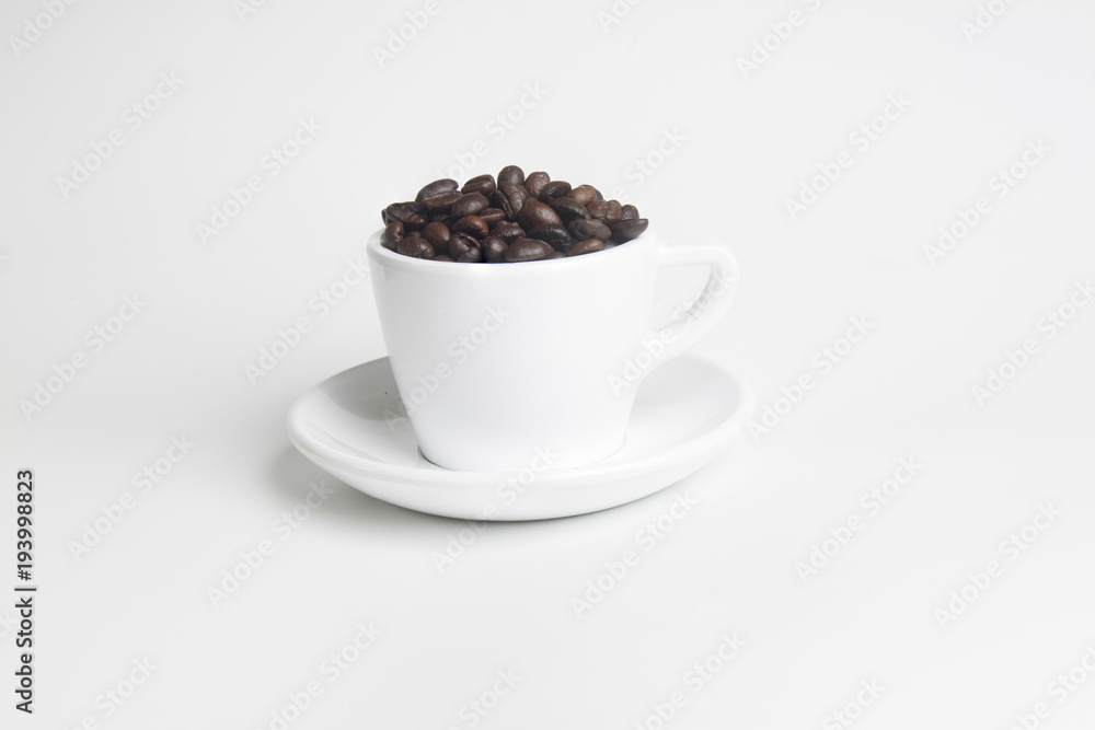 coffee beans in white cup on white background coffee beans in white cup on white background