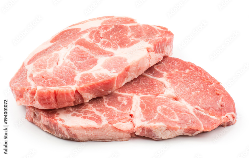 Raw pork neck meat cuts isolated on white background fresh two slices without bone .