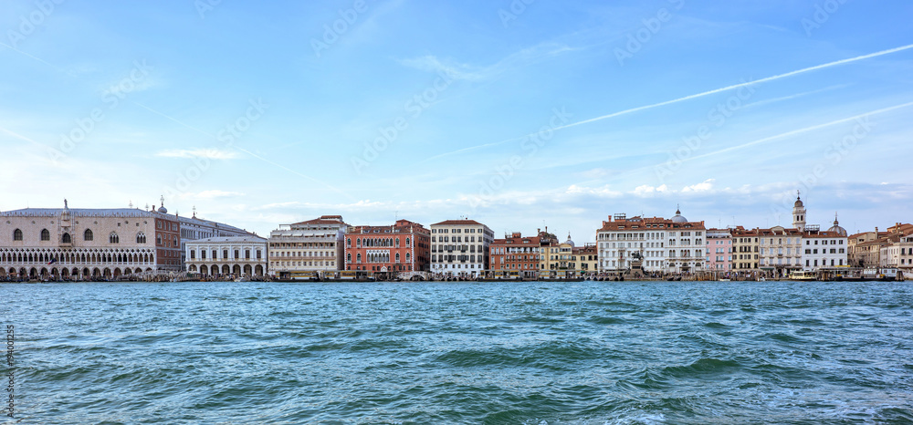 Daylight view from boat to Riva degli Schiavoni waterfront and c
