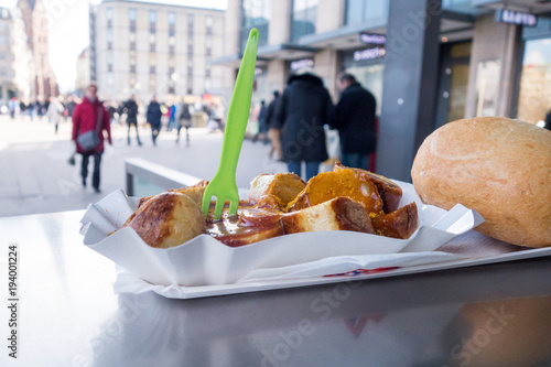 Currywurst Imbiss in deutscher Fußgängerzone photo