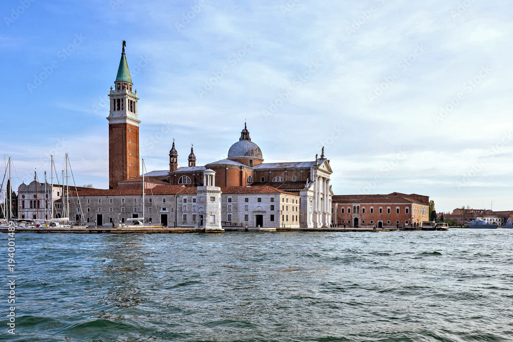 Daylight view from boat to San Giorgio Maggiore church with ornamented facade