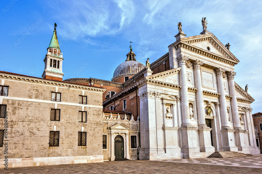 Daylight side view to San Giorgio Maggiore church facade with entrance