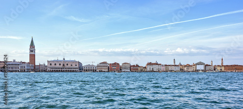 Daylight view from boat to Riva degli Schiavoni waterfront and colorful building