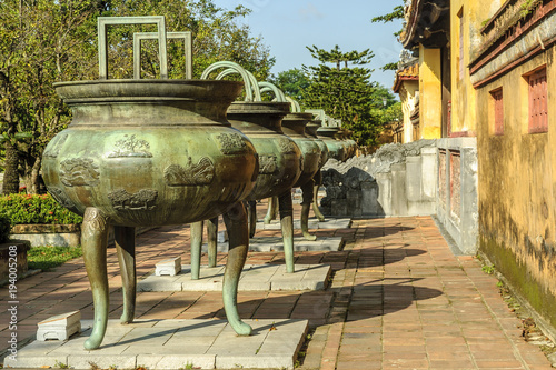 ancient bronze censers inside the imperial citadel in the city of Hue, Vietnam. © ahau1969