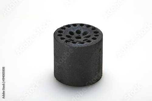 A 19 hole briquet isolated