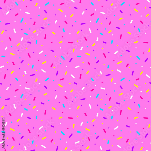 Seamless pattern with colorful sprinkles on pink background. Donut glaze background.