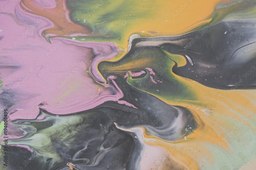 Fototapeta premium Trendy colorful artistic abstract marble background with shallow depth of field. Pink, yellow, green, black. Matte filter. Pastel colour.