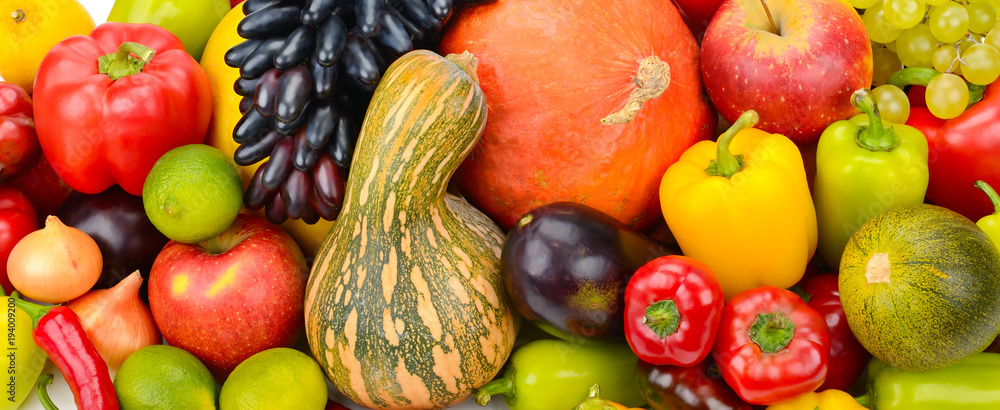 A set of fresh vegetables and fruits. Bright background.