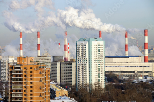 Smoking chimneys of the combined heat and power plant 20. Akademichesky district, Moscow, Russia photo