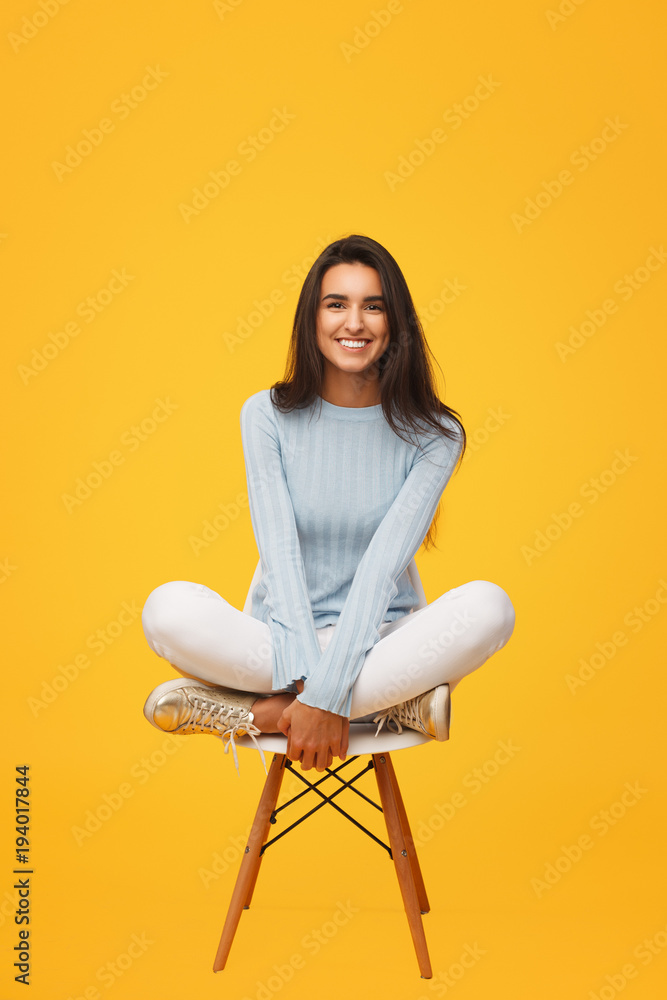 Wonderful young girl on chair Wonderful young girl on chair
