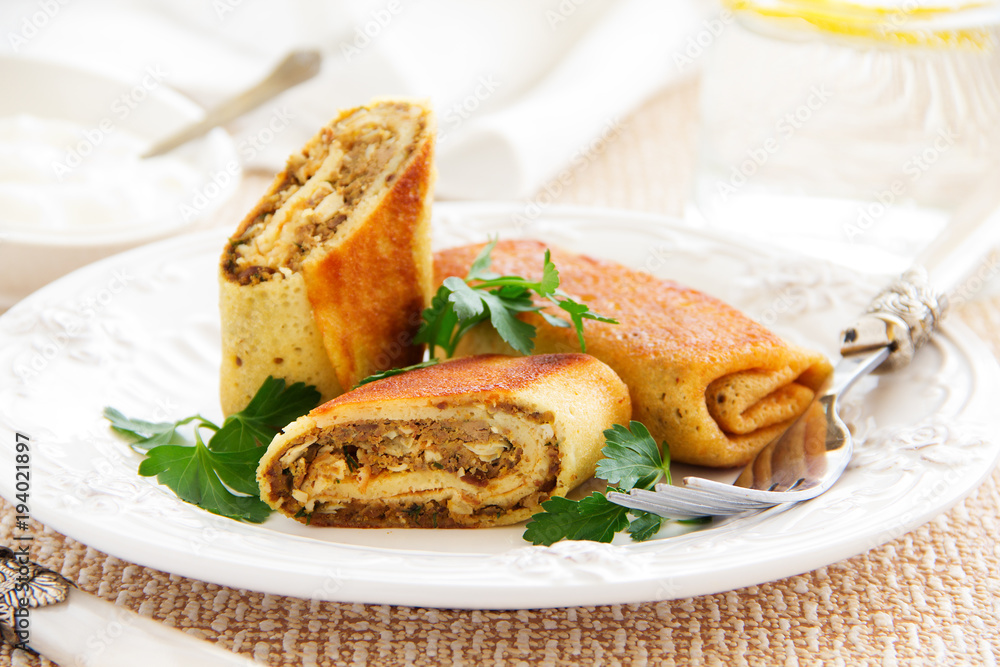 Pancakes stuffed with liver and eggs. Pancakes stuffed with liver and eggs.