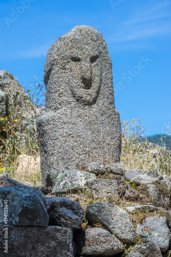 Menhir mit Gesicht in Filitosa auf der Insel Korsika photo