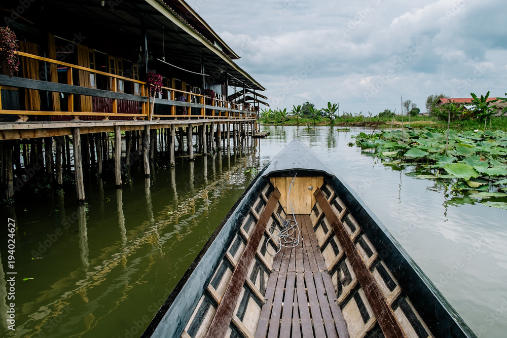Wooden floating houses on Inle Lake in Shan, Myanmar. Inle Lake is a freshwater lake located in the Nyaungshwe Township of Taunggyi District of Shan State.