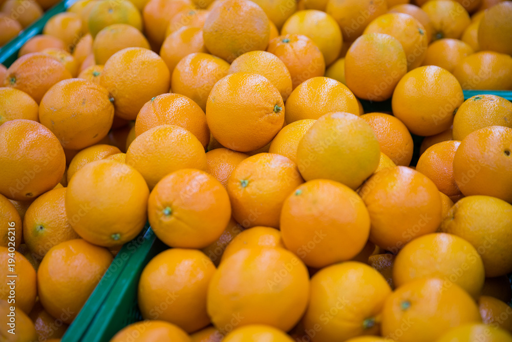 Oranges on the counter in the store. Close-up.