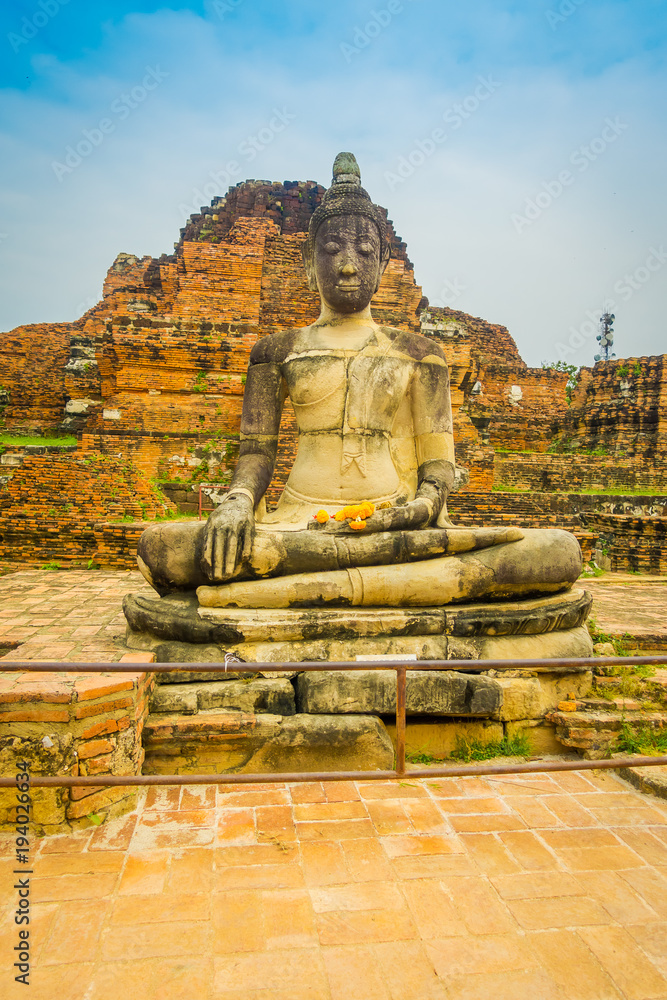 Beautiful outdoor view of the ancient budha at Ayutthaya Historical Park in the ruins of the old city Beautiful outdoor view of the ancient budha at Ayutthaya Historical Park in the ruins of the old city