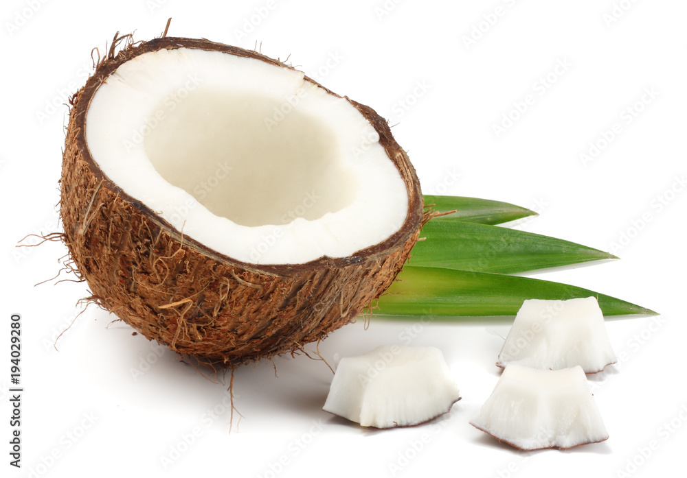 Coconut with green leaves isolated on white background Coconut with green leaves isolated on white background