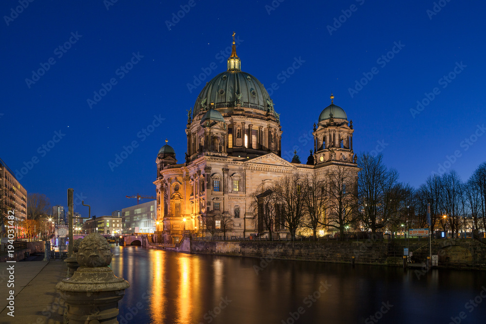 BERLIN, GERMANY - FEBRUARY 22, 2017: Cathedral (Berliner Dom) at famous Museumsinsel (Museum Island) with Spree river in beautiful twilight time.