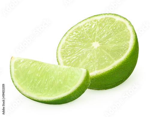Half and slice of fresh lime fruit isolated on white