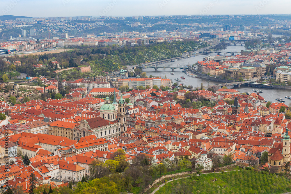 Obraz premium Panoramic view of old town along Vltava river, Prague, Czech Republic