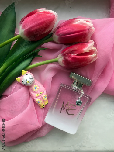 Tulips and perfume photo