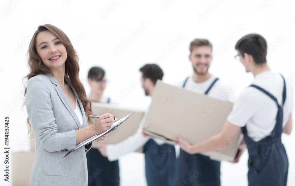 Businessman with documents, creating a stack of cardboard boxes. Businessman with documents, creating a stack of cardboard boxes.