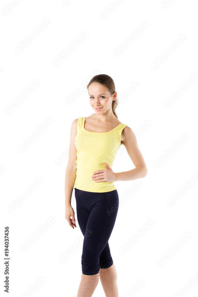 Fitness woman in sport style standing. Isolated. Fitness woman in sport style standing. Isolated.