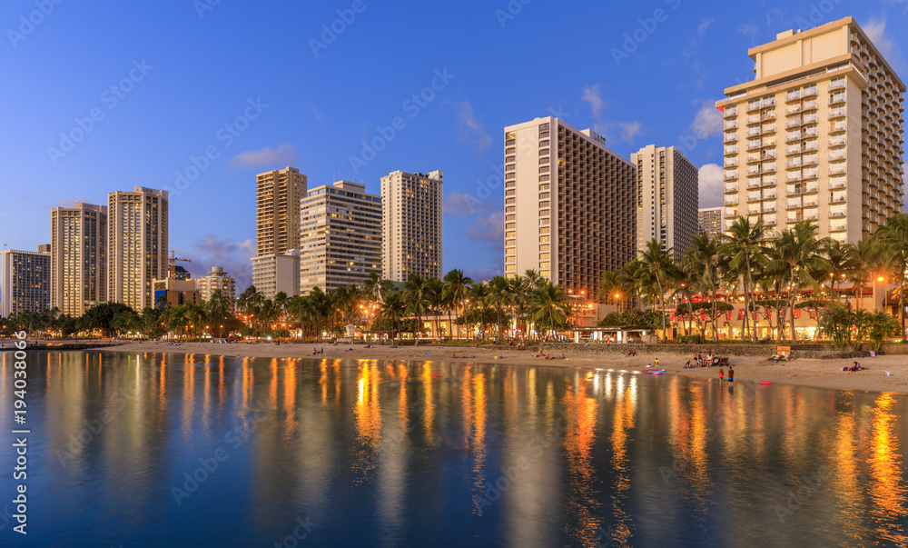 Waikiki Beach at sunset in Honolulu, Oahu, Hawaii