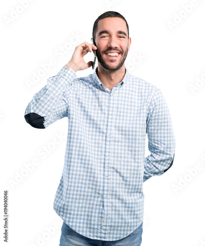 Happy young man on the phone