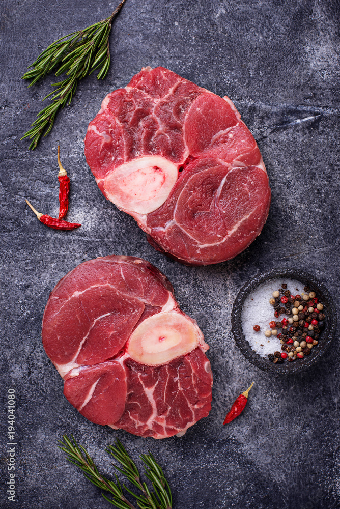 Raw meat osso buco with spices