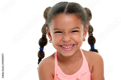 Quadro em tela Cute multiracial small girl smiling  - Isolated on white