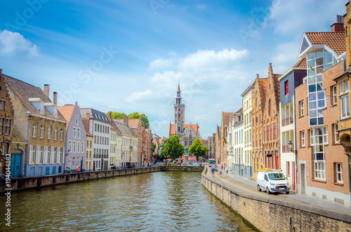 Beautiful canal Spiegelrei and Jan Van Eyck Square in Bruges (Brugge), Belgium