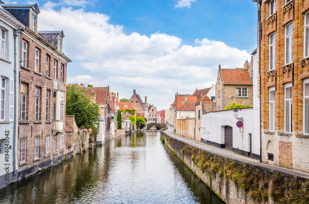 Beautiful canal and traditional houses in the old town of Bruges (Brugge), Belgium