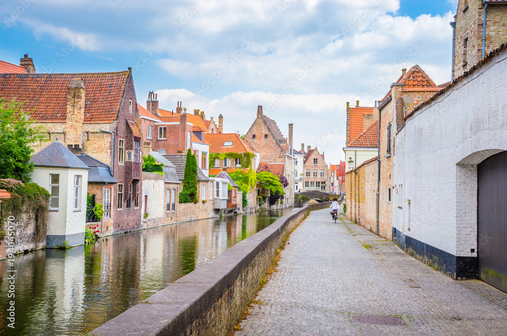 Beautiful canal and traditional houses in the old town of Bruges (Brugge), Belgium