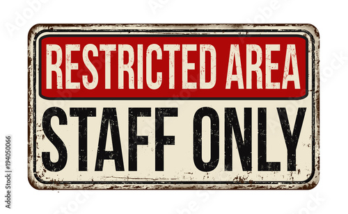 Restricted area staff only vintage rusty metal sign