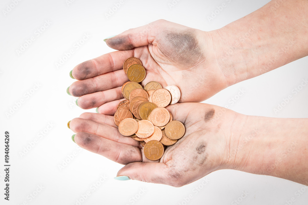 two dirty hands isolated at the white background holding coins two dirty hands isolated at the white background holding coins