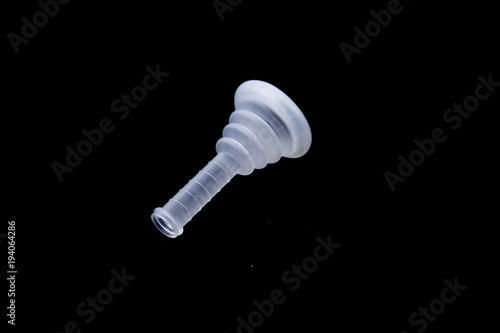 external condom catheter used in patient care at the black background