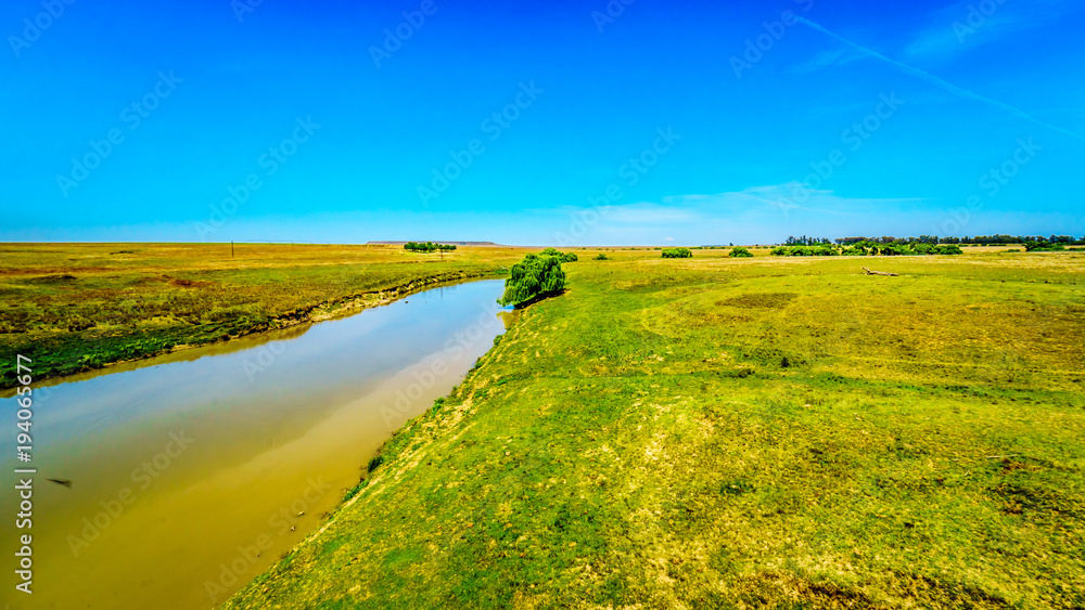 Fototapeta premium Fertile farmland surrounding the Klipriver near the town of Standarton in Mpumalanga Province in South Africa