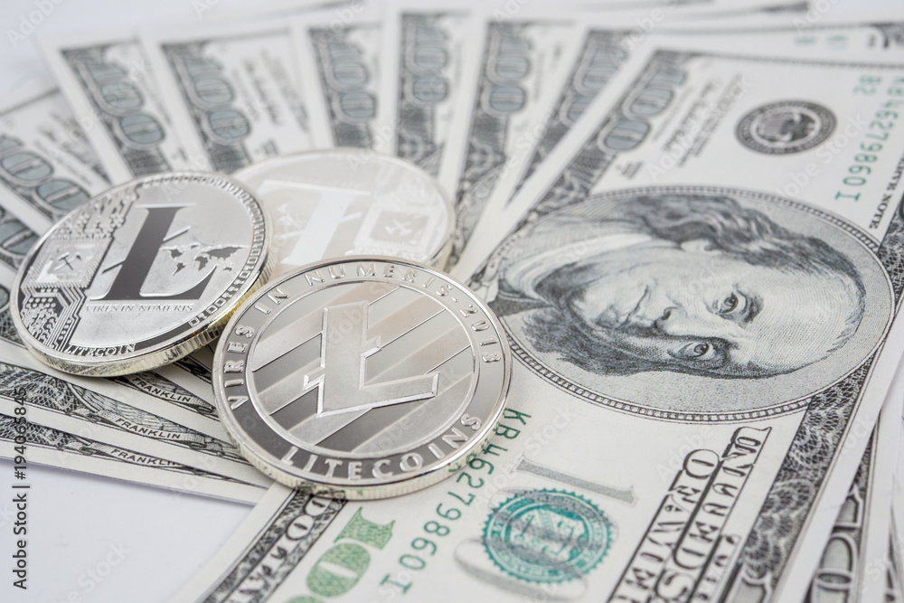 Litecoin golden coin New virtual money and dollar background Litecoin golden coin New virtual money and dollar background