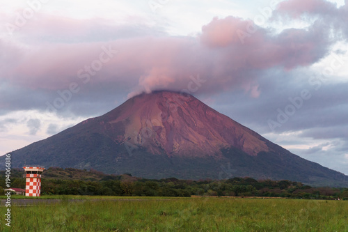 beautiful view of the volcano on Ometepe island, pink sunset